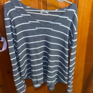 Hi, I am selling this deep neck sweater from altered state, hardly been worn.